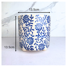 Load image into Gallery viewer, Cyanne Ceramic planter with blue floral pattern on a white background, featuring the brand &#39;LEAFERIE&#39;.
