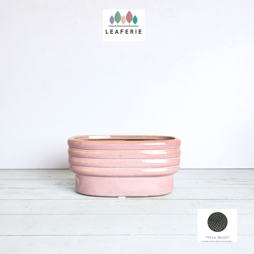 The Leaferie Peony rectangular pink ceramic pot. 