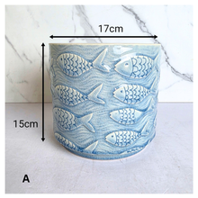 Load image into Gallery viewer, Lumera with fish pattern flowerpot on a white background, featuring the brand 'LEAFERIE'.
