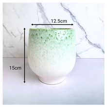 Load image into Gallery viewer, Calista Green textured vase on a marble background with 'LEAFERIE' branding.
