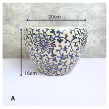 Load image into Gallery viewer, Aveline Ceramic planter with blue floral pattern on a gray background, featuring the Leaferie brand.
