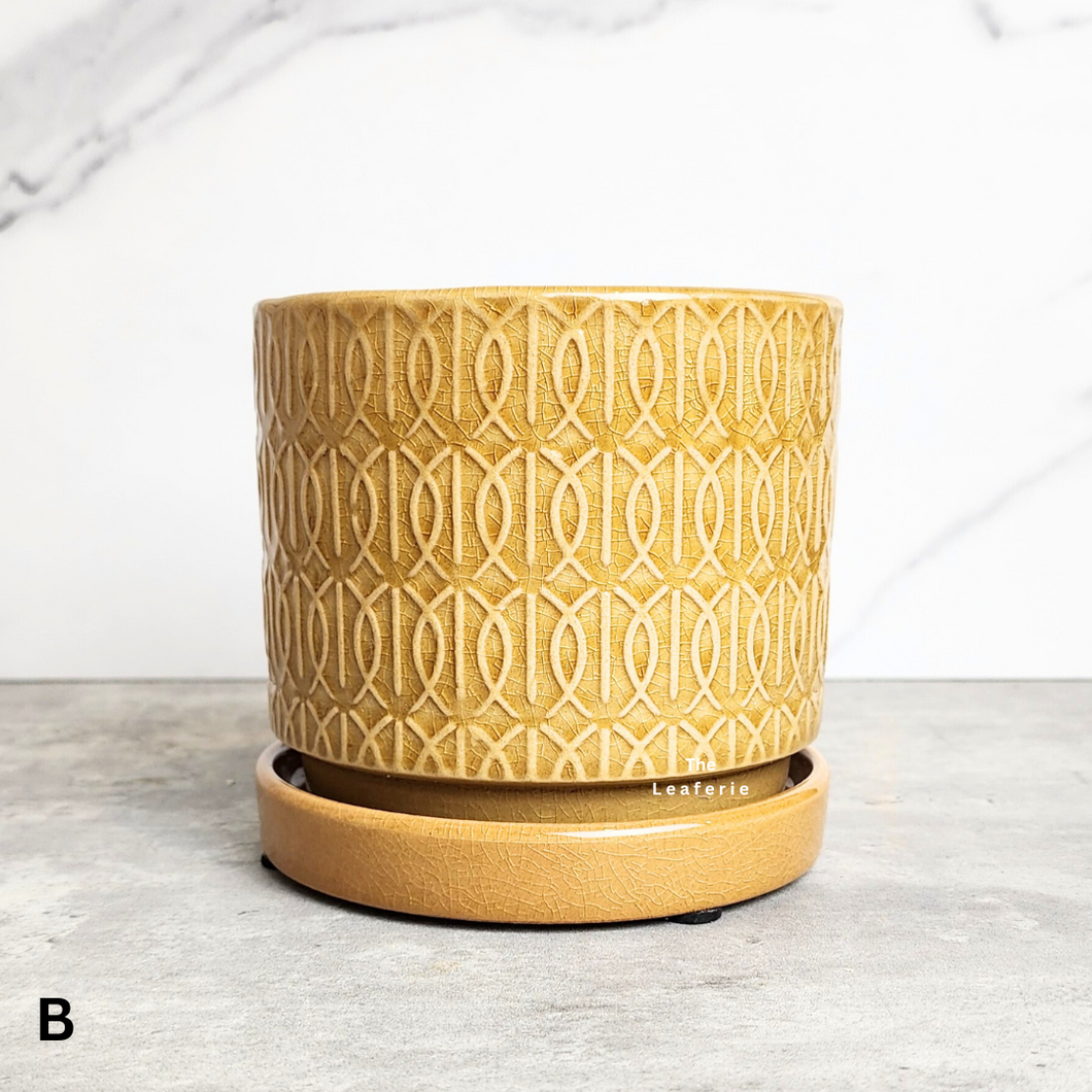 The Leaferie Madigan yellow flowerpot with matching tray. ceramic material. Design B