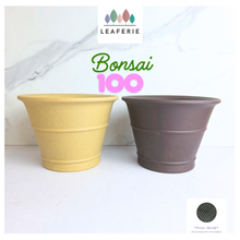 Load image into Gallery viewer, 'LEAFERIE Bonsai 100'. One pot is pale yellow and the other is dark brown. Zisha material
