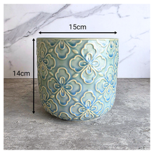Load image into Gallery viewer, Tory Two ceramic pots with floral patterns on a marble surface, featuring the Leaferie brand.
