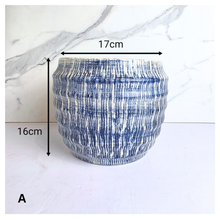 Load image into Gallery viewer, Hira Blue and white textured vase on a marble surface with 'LEAFERIE' 
