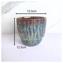 Load image into Gallery viewer, Cielo Ceramic pot with textured surface on a white background, featuring the brand &#39;LEAFAERIE&#39;.
