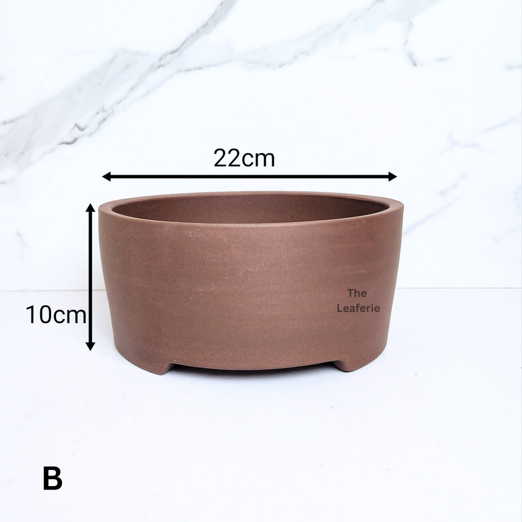 The Leaferie Reimi Bonsai Pot (Series 4) round zisha material. 4 sizes