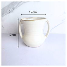 Load image into Gallery viewer, Ivora White ceramic mug with handles on a light gray background, featuring the LEAFERIE brand.
