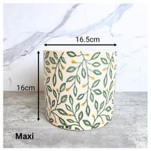 Load image into Gallery viewer, Aurelia Decorative pot with leaf pattern on a marble surface, featuring the brand 'LEAFAERIE'.
