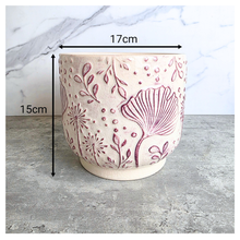 Load image into Gallery viewer, Dalia Ceramic planter with floral pattern on a marble surface, featuring the brand 'LEAFERIE'.
