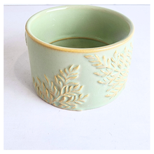 Load image into Gallery viewer, Mirela Decorative ceramic pot with leaf patterns on a white background, featuring the brand &#39;LEAFERIE&#39;.
