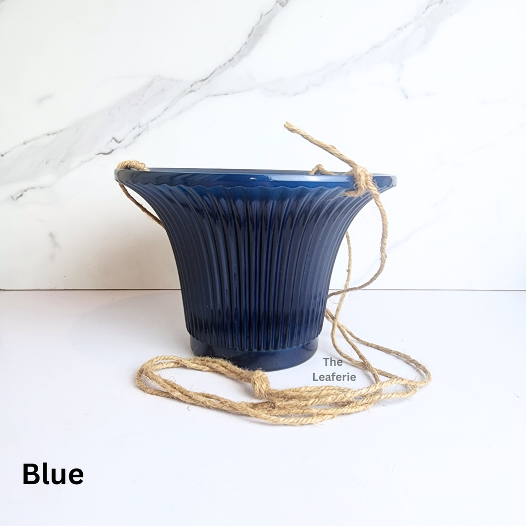 The Leaferie Lyon hanging flowerpot . 3 colours blue, green and white and 2 sizes . Ceramic material