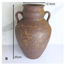 Load image into Gallery viewer, Orin Three rustic brown ceramic vases with handles on a white background, featuring the brand &#39;LEAFERIE&#39;.
