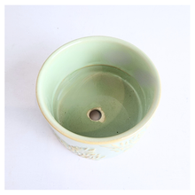 Load image into Gallery viewer, Mirela Decorative ceramic pot with leaf patterns on a white background, featuring the brand &#39;LEAFERIE&#39;.
