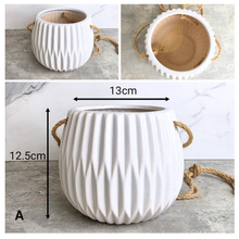 Load image into Gallery viewer, Lyon 19 four hanging pots with 'Leaferie' branding and product details.
