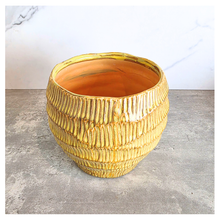 Load image into Gallery viewer, Prairie Gold textured planter on a gray surface with 'LEAFERIE' 
