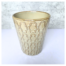 Load image into Gallery viewer, Vionna Beige ceramic pot with decorative patterns on a white surface, branded &#39;LEAFERIE&#39;.
