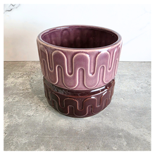 Load image into Gallery viewer, Zafira Brown ceramic planter with wavy pattern on a gray surface, branded 'LEAFERIE'.
