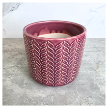 Load image into Gallery viewer, Zoya Pink ceramic pot with leaf pattern on a gray surface, branded 'LEAFERIE'.
