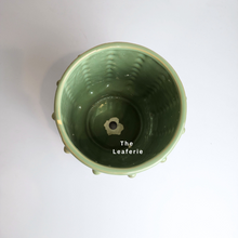 Load image into Gallery viewer, The Leaferie Lindy planter. 2 colours beige and green. ceramic planter. top view of Pot A
