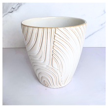 Load image into Gallery viewer, Nivelle Ceramic planter with marbled design on a marble background, featuring the brand 'LEAFAERIE'.

