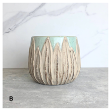Load image into Gallery viewer, Rowan ceramic planters with textured design on a gray surface, branded 'LEAFERIE'.
