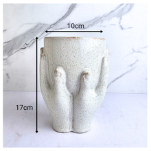 Load image into Gallery viewer, Hannie ceramic vase labeled 'Hannie' on a marble background with 'LEAFERIE' branding.
