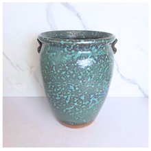 Load image into Gallery viewer, Oro Speckled green ceramic vase with 'LEAFAERIE' branding on a white background
