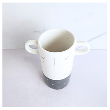 Load image into Gallery viewer, Dorei Two pots with polka dot and striped design on a marble background, featuring the LEAFERIE brand.
