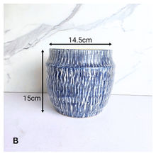 Load image into Gallery viewer, Hira Blue and white textured vase on a marble surface with 'LEAFERIE' 
