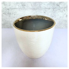 Load image into Gallery viewer, Yule snowflakes White textured planter with gold interior on a light gray background, featuring the Leaferie brand.
