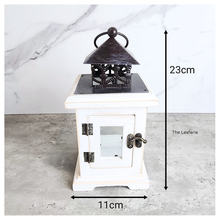 Load image into Gallery viewer, Luma White lantern with black top on a gray surface, measurements indicated.

