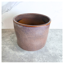 Load image into Gallery viewer, Sylvie Ceramic planter labeled 'Sylvie' on a gray surface with 'LEAFAERIE' 
