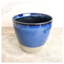 Load image into Gallery viewer, Ryder Blue and beige ceramic planter with 'Leaferie' branding on a marble background
