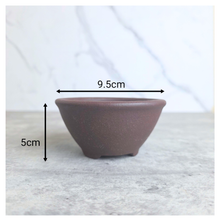 Load image into Gallery viewer, Petit bonsai 28. Collage of terracotta bonsai pots with 'LEAFERIE' branding on a light background.
