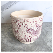 Load image into Gallery viewer, Dalia Ceramic planter with floral pattern on a marble surface, featuring the brand 'LEAFERIE'.
