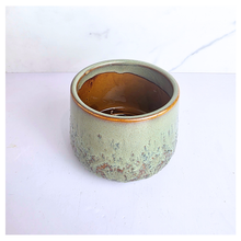 Load image into Gallery viewer, Tero Green ceramic cup with speckled texture on a white background, featuring the LEAFAERIE brand.
