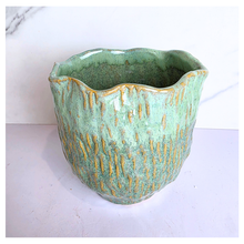 Load image into Gallery viewer, Lime Green ceramic vase with gold accents on a white background, featuring the Leaferie brand.
