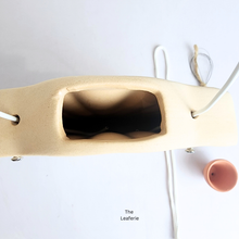 Load image into Gallery viewer, Ysla Beige leather pouch with a black interior on a white background, branded &#39;The Leaferie&#39;.
