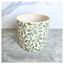 Load image into Gallery viewer, Aurelia Decorative pot with leaf pattern on a marble surface, featuring the brand 'LEAFAERIE'.
