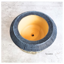 Load image into Gallery viewer, Round woven basket with yellow center on a light gray background
