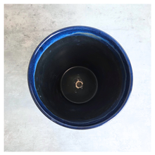 Load image into Gallery viewer, Ryder Blue and beige ceramic planter with 'Leaferie' branding on a marble background
