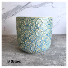 Load image into Gallery viewer, Tory Two ceramic pots with floral patterns on a marble surface, featuring the Leaferie brand.
