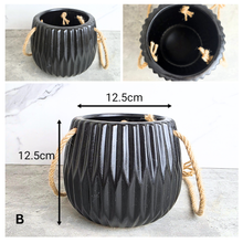 Load image into Gallery viewer, Lyon 19 four hanging pots with 'Leaferie' branding and product details.
