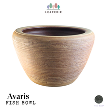 Load image into Gallery viewer, A leaferie Avaris fish bowl with a textured, tapered shape in a warm sandy beige color, featuring a dark brown glazed interior. The image includes the brand logo 'LEAFERIE' at the top, the product name 'Avaris FISH BOWL' at the bottom left, and a circular texture swatch at the bottom right.
