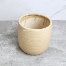 Load image into Gallery viewer, The Leaferie Noa ceramic pot. beige colour

