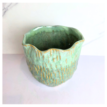 Load image into Gallery viewer, Lime Green ceramic vase with gold accents on a white background, featuring the Leaferie brand.

