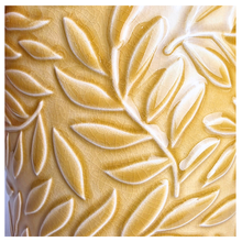 Load image into Gallery viewer, Marigold Yellow ceramic pot with leaf pattern on a marble background, featuring the Leaferie brand.
