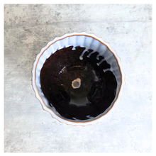 Load image into Gallery viewer, Jace Ceramic planter with striped design on a marble surface, featuring the brand 'LEAFERIE'.
