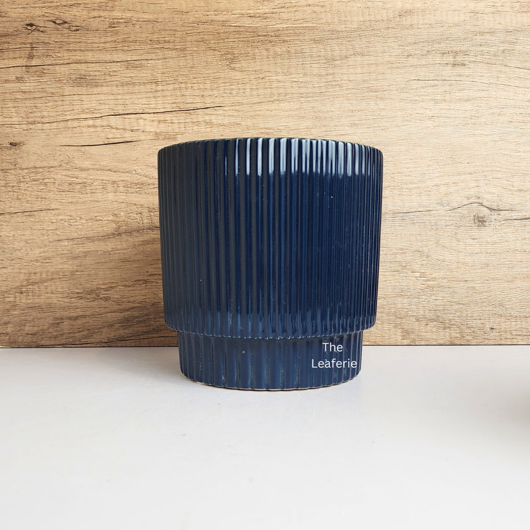 The Leaferie Sonnet blue ceramic pot.